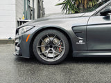 Paragon front brake kit visible behind the wheel on a gray BMW F80 M3